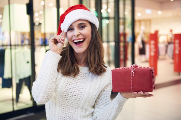 Happy woman shopping in the mall